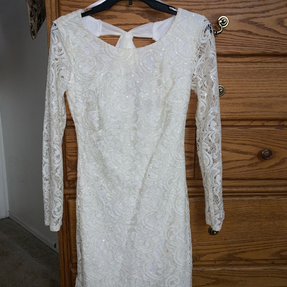 B. Darlin dress, glittery/sparkly, long sleeve, above knee length, color white